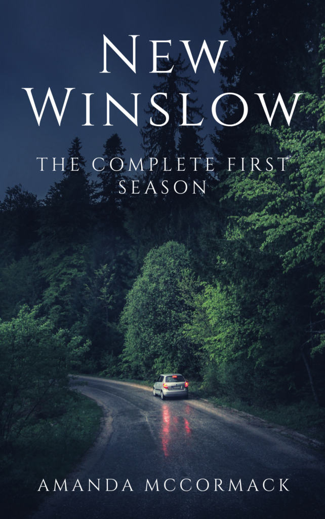 Image shows a dark wooded road against a night sky full of stars. Text at the top of the image reads New Winslow: The Complete First Season. Underneath that is written Amanda McCormack